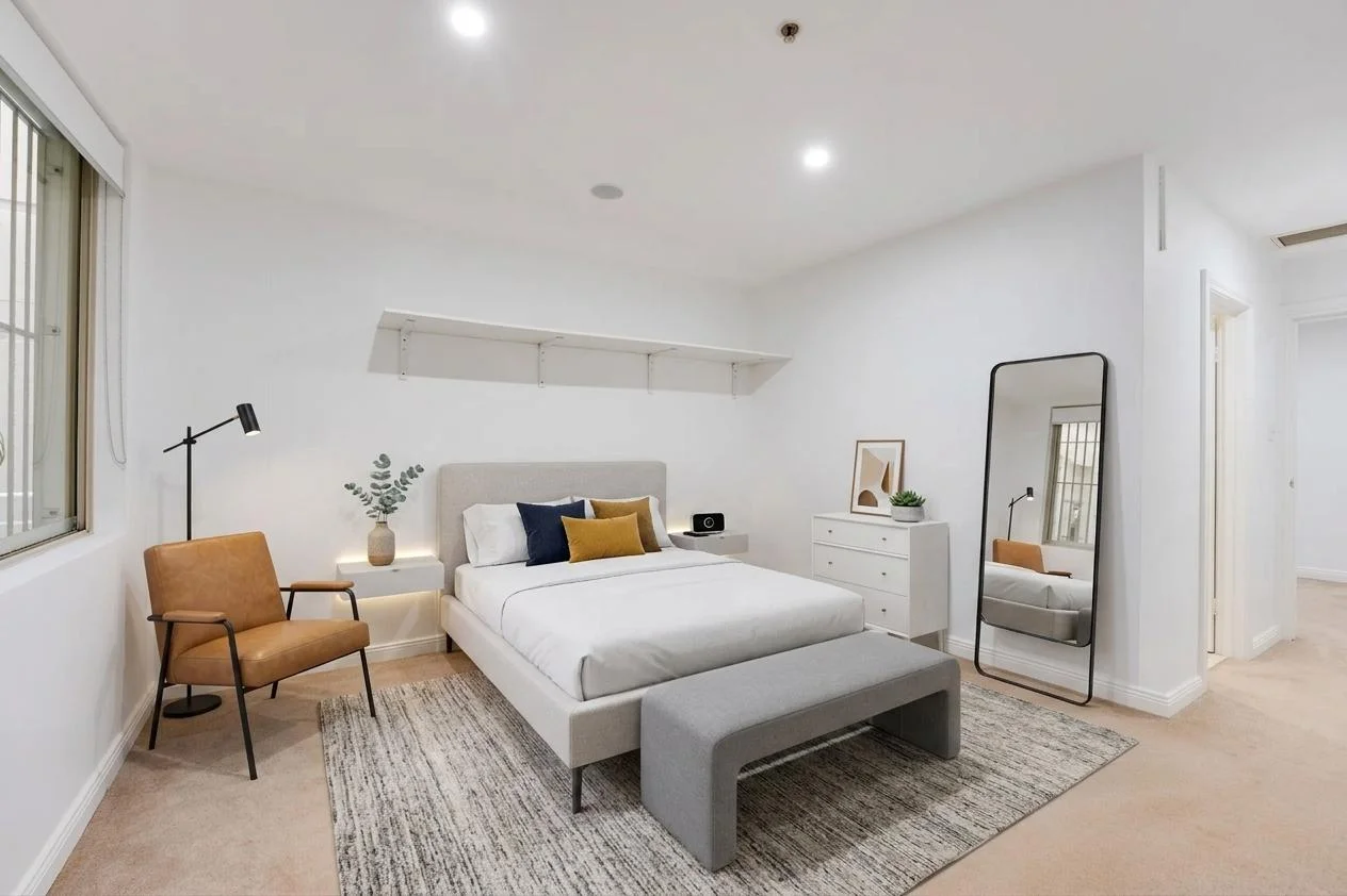 A second attempt at the same room, from the same competing tool: it added a doorway and hallway on the right that don't exist in the original photo.